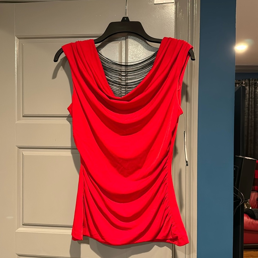Red cowl neck shirt with black string peak a boo back